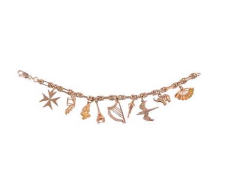 
	
		A GOLD COLOURED CHARM BRACELET
		The fancy link bracelet to a lobster claw clasp, stamped 375, suspending various charms