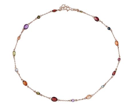 
	
		ETIENNE WILFRED VERNIQUET, A 9 CARAT GOLD MULTI GEM NECKLACE 
		LONDON 1985
		The necklace with various spectacle set ov