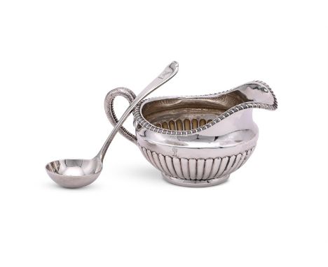 
	
		A GEORGE III SILVER CREAM JUG
		WILLIAM BURWASH, LONDON 1813
		The half lobed body with a gadrooned border, twin serpent