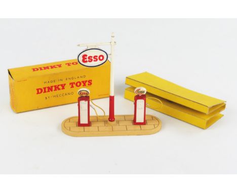 A Dinky Toys 781 Petrol Pump Station 'ESSO' in yellow non-picture box. Near mint in near mint box with packing innards 