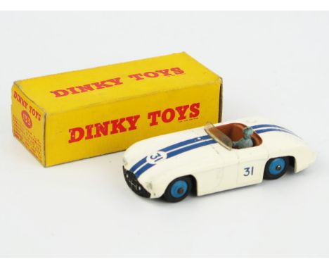 A Dinky Toys 133 Cunningham C-5R Road Racer in white  with dark blue stripes, brown interior, light blue driver and blue hubs