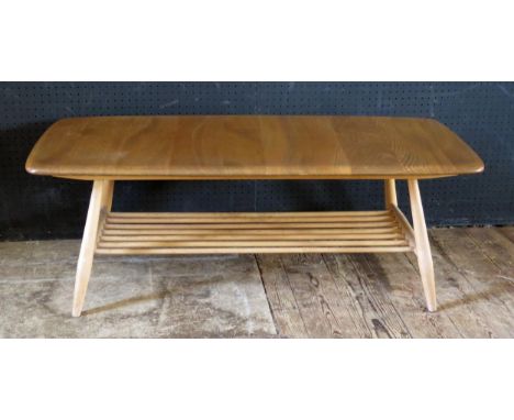 Ercol light Elm Coffee Table with magazine rack below, 105(w)x36.5(h)x46(w)cm 