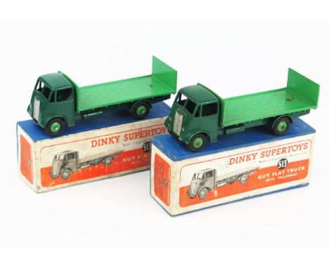 Two Dinky Supertoys 513 Guy Flat Trucks with tailboards (variations) both type 1 cab, dark Brunswick green cab, wings and cha