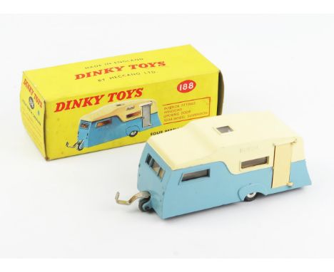 A Dinky Toys 188 Four Berth Caravan in blue/cream with spun hubs in light yellow picture box with correct colour spot. Near m