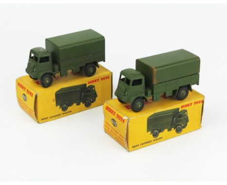 Two Dinky Toys 623 Army Covered Wagons (Bedford QL) no driver or windows in dark yellow picture boxes. Near mint but one has 