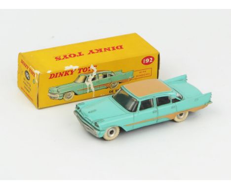 A Dinky Toys 192 De Soto Fireflite Sedan in turquoise with tan roof and flash, spun hubs and white tyres in correct colour sp