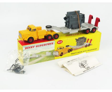 A Dinky Supertoys Mighty Antar with Transformer (Thornycroft) - yellow tractor unit, light grey trailer, red ramps and hubs. 