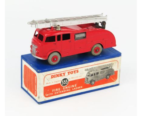 A Dinky Toys 555 (Commer) Fire Engine with Extending Ladder in red with silver ladder, no windows, red hubs and grey tyres in