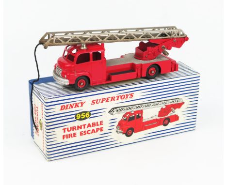 A Dinky Supertoys 956 Turntable Fire Escape (Bedford) in red with red hubs, silver deck and no windows. Excellent, some rust 