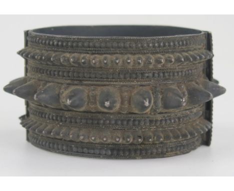 Nineteenth Century Indian Silver Hinged Spike Bangle, 36mm wide, 54x48mm inside dimensions, 52g. Pin missing 