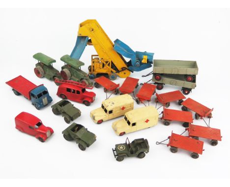 Twenty-One Dinky Toys Fire Engine, Ambulances, Road Rollers, Army Vehicles, Van, Guy Truck and Trailers. Playworn to very goo