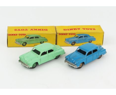 Two Dinky Toys 172 Studebaker Land Cruiser, one light green with mid green hubs and one in blue with fawn hubs both in correc