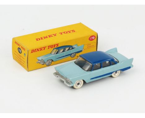 A Dinky Toys 178 Plymouth Plaza in light blue with dark blue roof and flash, spun hubs and mottled base in correct colour spo