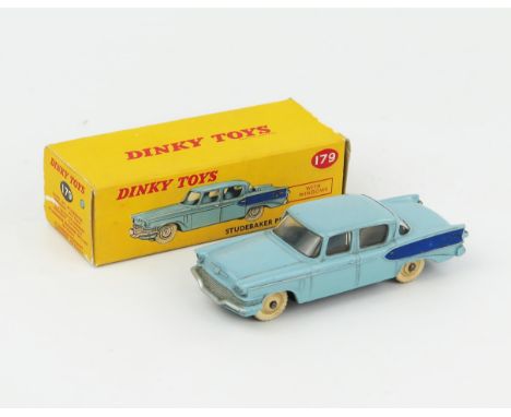 A Dinky Toys 179 Studebaker President Sedan in light blue with dark blue flash and cream hubs in correct colour spot type 1 p