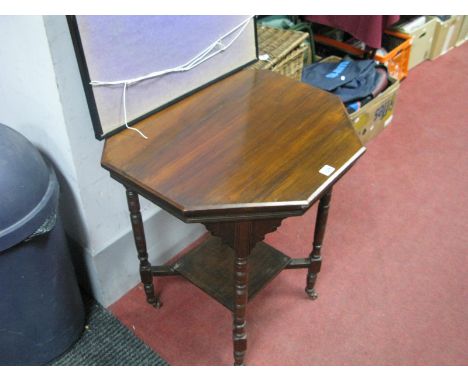 An Edwardian Walnut Octagonal Shaped Table on turned legs, with under shelf.