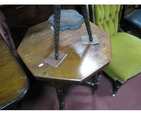 An Edwardian Walnut Octagonal Shaped Table on turned legs, with under shelf.