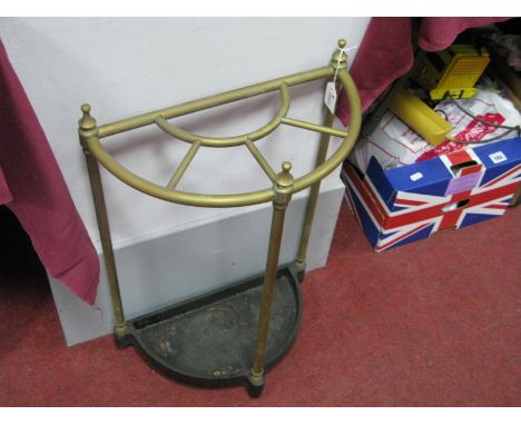 A Brass Demi Lune Stick Stand, with cast iron drip tray, height 59cm.