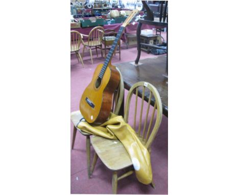 A Pair of Ercol Light Elm Comb Back Chairs, on 'H' stretchered legs, and a Len Lewis acoustic guitar. (3)