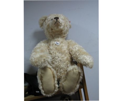 A Modern Steiff Bear, blond plush, length 67cm, with associated bag 'North American Exclusive 2007'.