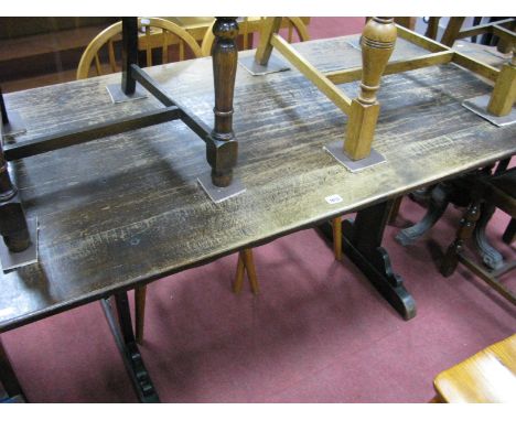 An Ercol Style Peg Constructed Rectangular Topped Dining Table, standard ends with stretcher.