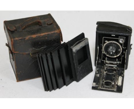 A Houghton Butcher plate camera with box and plates.