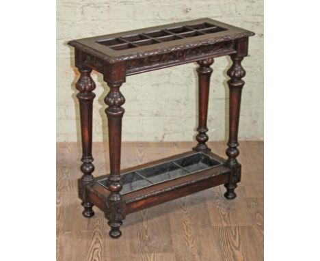 A carved oak stick stand circa 1900, length 69cm, depth 30cm & 79.5cm.