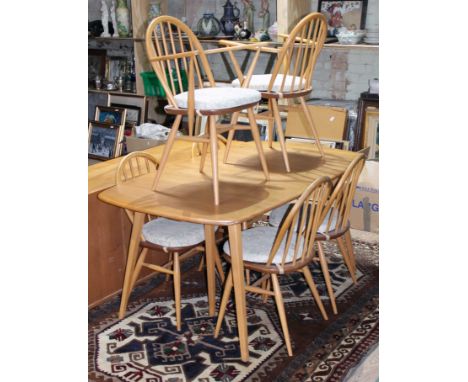 An Ercol blonde elm and beech extending dining table and six chairs, min. table dimensions; length 154cm, depth 90cm & height