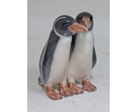 A Royal Copenhagen porcelain model formed as a pair of penguins, height 9.5cm. CONDITION REPORT - minor chip to one beak othe