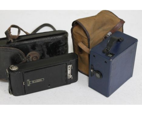 An Ensign E29 blue box camera and a Kodak A116.