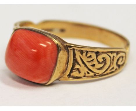 A hallmarked 9ct gold coral cabochon ring, gross wt. 3.8g, size Q/R.