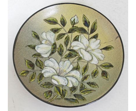 A pottery dish by Christopher Dresser for Linthorpe pottery, diam. 20cm. CONDITION REPORT - general wear to include a mark to