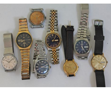 A quantity of vintage wristwatches.