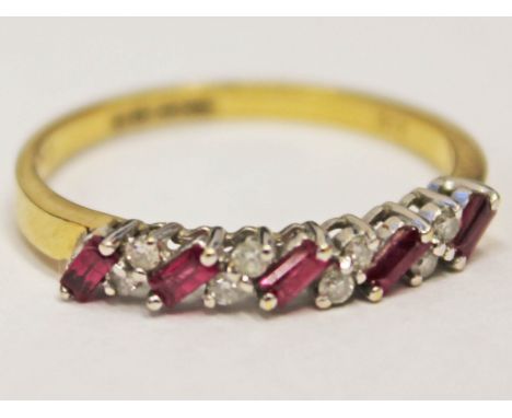 A hallmarked 18ct gold ruby and diamond ring, gross wt. 2.8g, size S.