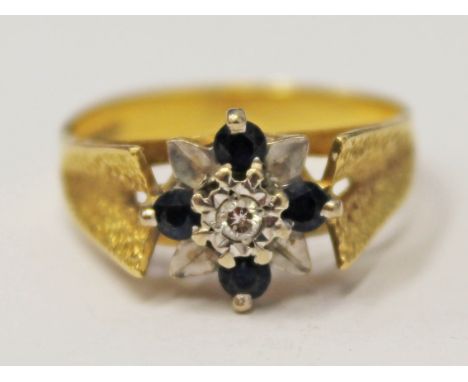 A hallmarked 18ct gold diamond and sapphire ring, gross wt. 4.8g, size R/S.