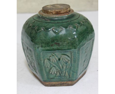 An Oriental green glazed ginger jar, height 16cm. CONDITION REPORT - imperfection to base otherwise ok.