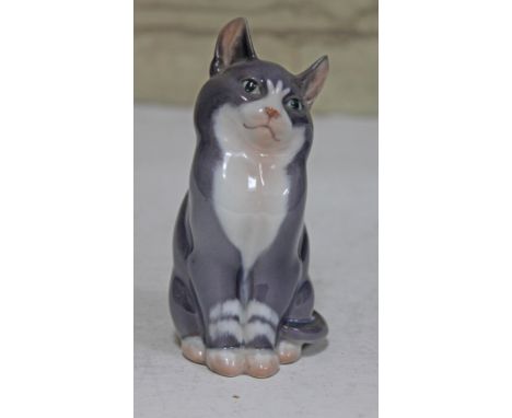 A Royal Copenhagen porcelain model cat, height 13cm. CONDITION REPORT - very good, no damage/repair, little/no wear.