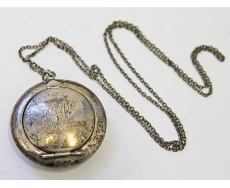 A hallmarked silver compact on unmarked white metal chain, length 38cm.