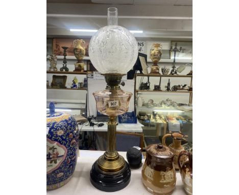 A Victorian oil lamp with brass column, Pintz cut glass font &amp; acid etched shade