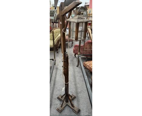 A vintage adjustable lantern standard lamp 