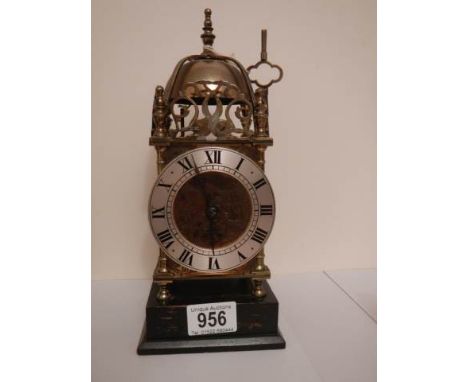 A late Victorian lantern clock in working order. 