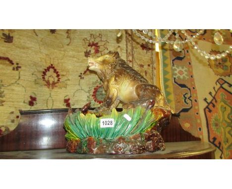 A large ceramic planter in the shape of a wild boar.No damage, late 20th century.