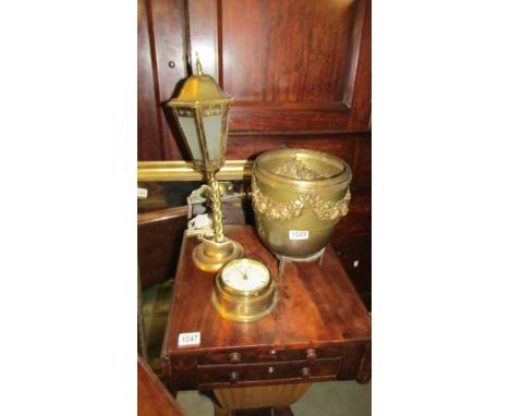 A brass planter, a brass lantern, ships clock etc.,