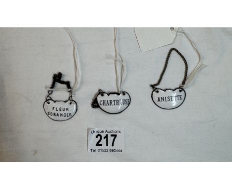 Three French antique enamel decanter labels C1870 - Fleur D'Oranger', 'Anisette' and 'Chartreuse'.