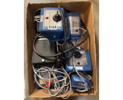 A box of Marklin model railway power supplies 