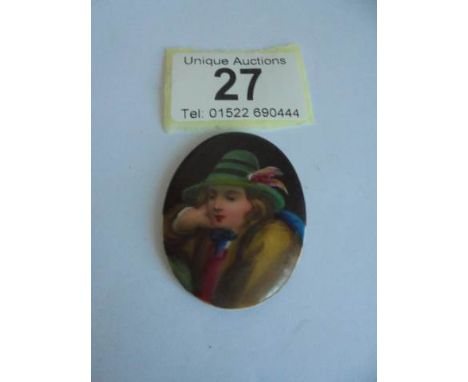 A hand painted miniature portrait of a lady on porcelain. 