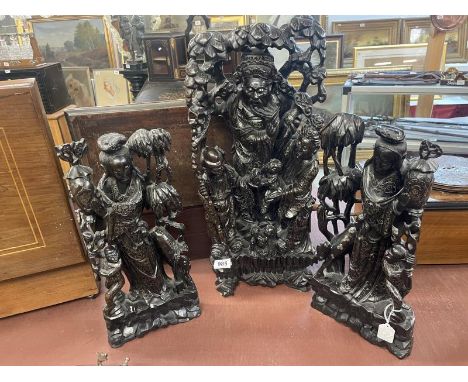 A set of three fine carved Chinese Deity figures, inlaid with silver wire, tallest figure is 60 cm.