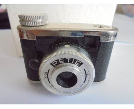 A cased PETIE miniature camera, made in Western Germany.