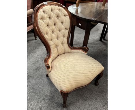 A Victorian button back ladies chair 