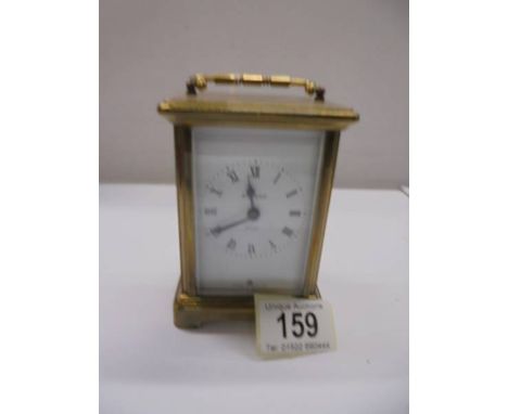 A French Bayard brass carriage clock. 