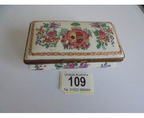 A 19th century porcelain trinket box.